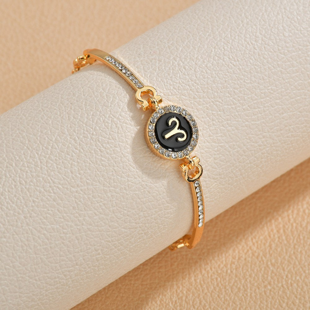Wholesale Drip Oil 12 Constellation Gold Rhinestone Alloy Bracelet